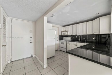 2311 S Cypress Bend Dr unit 217A, Pompano Beach, FL 33069 - photo 2