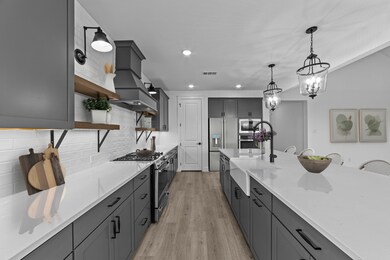 Kitchen with white apron-front sink