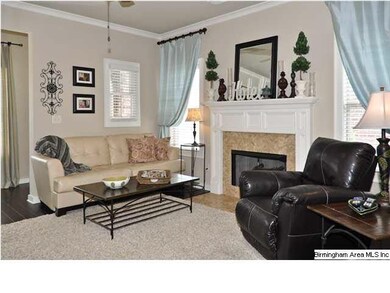The living room with a gas fireplace, handscraped 