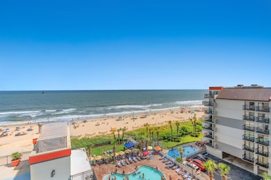 View of water feature with a beach view