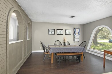 Formal den (currently being used as dining)