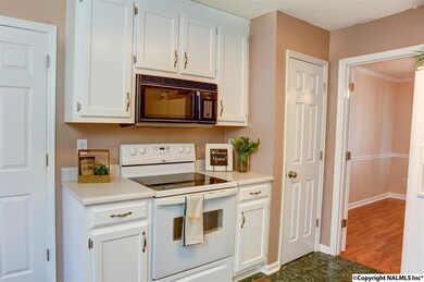 Save your cabinet space for kitchen gadgets and dishes. This pantry is conveniently located right next to the stove.