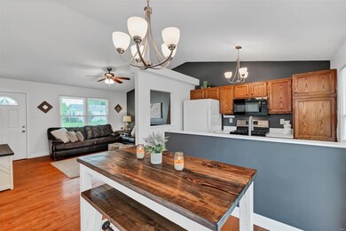 Lovely brushed nickel feature lighting in the kitchen and dining room!