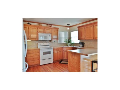 The kitchen also offers a double sink & offers ple