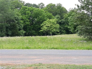 Across the street from land.