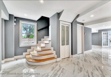 Gleaming porcelain floors in entryway