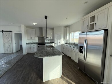 57654 E Harvard Place, Strasburg, CO 80136 - photo 6