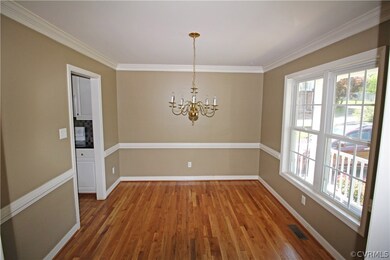 Dining room features include double window, refini