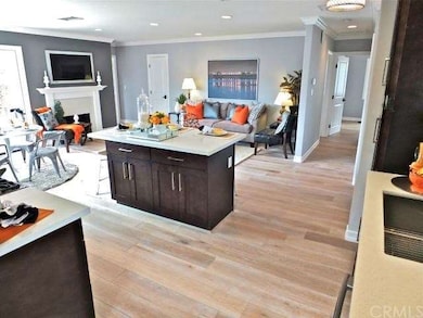 Full spectrum view of the kitchen, living room, di