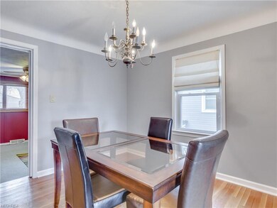 Dining room, hardwood floor, entry to the family r