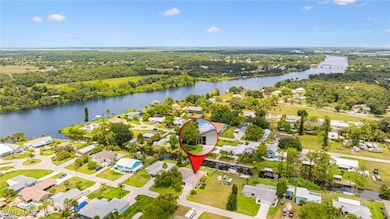 Aerial perspective of suburban area with a nearby
