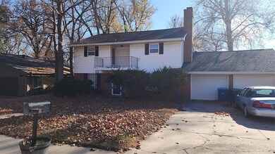 Front facade with a balcony and a garage