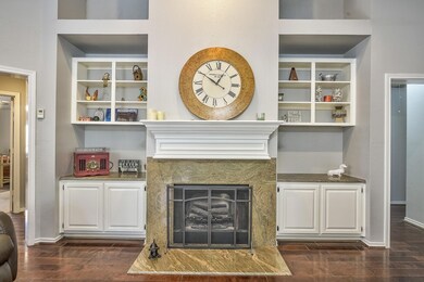 Interior details featuring baseboards, wood finish