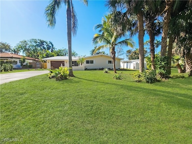 View of front of house featuring a garage and a fr