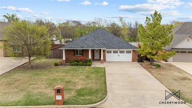 View of front facade featuring concrete driveway, 