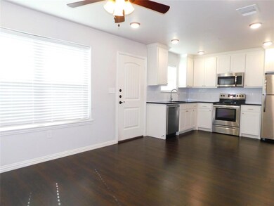 Living Area, Breakfast Area into Kitchen