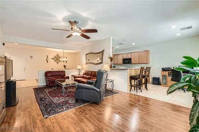 Living area with light wood-type flooring, recesse