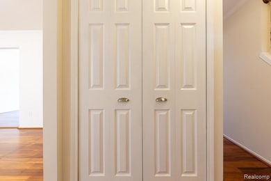 Detailed view of wood finished floors and ornamental molding