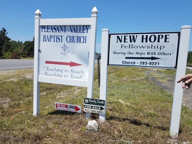 Signs at end of Miles Still Rd
