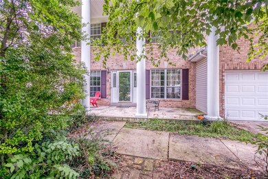 2 Story with covered porch, Brick front, Vinyl sid
