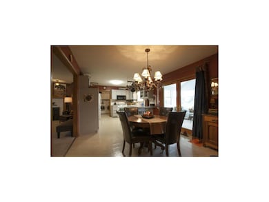 Large Kitchen/Dining, Doors lead to Sunroom