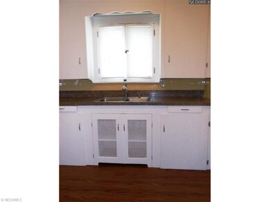 New Laminate Floor and Counters in Both Kitchens