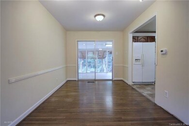 DINING AREA: The hardwood floors continue into the