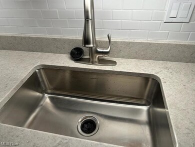 New Countertop and Stainless Steel Sink
