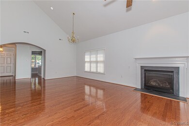 Unfurnished living room with ceiling fan with nota