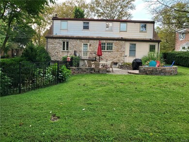 Rear elevation pic 2 - back yard w/hardscaping sea