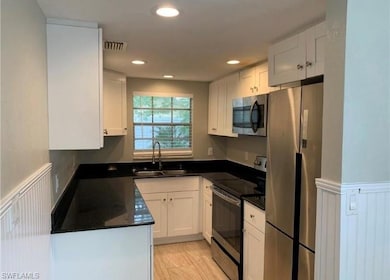 819 Courtington Ln unit 2, Fort Myers, FL 33919 - photo 2