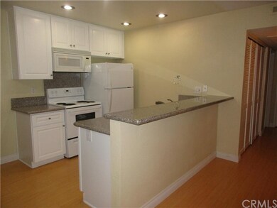 Remodeled Kitchen With Bar Top.