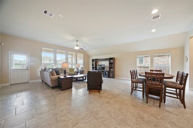 This room really is huge!  The open concept for the living, dining & kitchen makes entertaining 
easy.