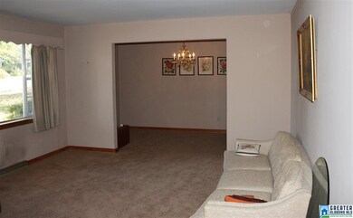 Living room has large window for lots of light.