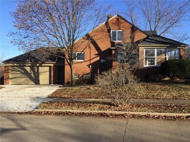 Side view facing Dartworth. Notice the brand new driveway.
