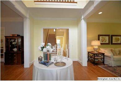 Standing at the door, guests see formal dining roo
