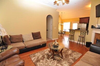 Step inside and be greeted by gleaming hardwood fl