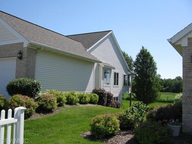 8318 Rockledge Way SW unit 15, Byron Center, MI 49315 - photo 2