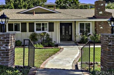 Charming and inviting front walkway.