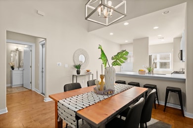 Dining space featuring light wood-type flooring, 