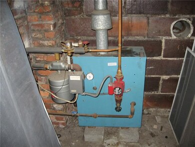 Hot water boiler for 3rd unit above garage.