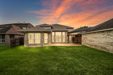 This photo showcases a spacious backyard with a we