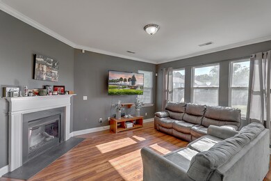 Family room with corner fireplace