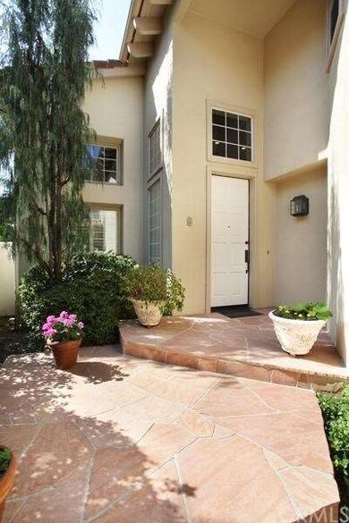 Charming Entry with Flagstone Walkway.