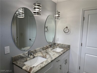 Full bathroom with double vanity