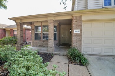 Enjoy a cup of coffee on your covered front porch.