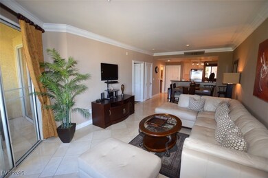 Living room with baseboards, ornamental molding, v