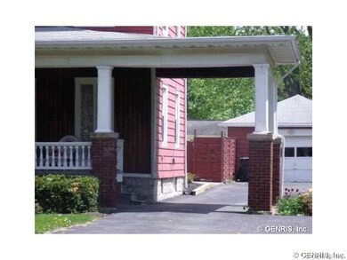 Exterior Front. Carport