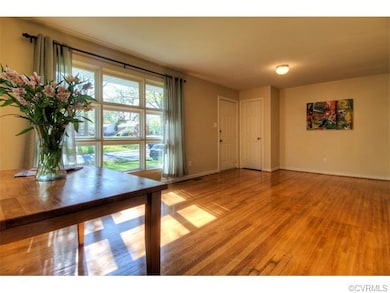 LIVING ROOM WITH OAK HARDWOOD