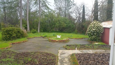 View from front patio to backyard